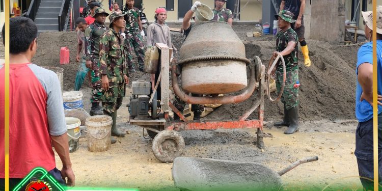 Satgas TMMD Kodim 1512/Weda ke-122, Bersama Masyarakat Desa Akeici Bangun Jalan Rabat Beton
