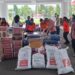 Telkomsel Serahkan CSR Bantuan Logistik ke Korban Banjir Bandang di Pulau Siau