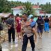 Banjir Rendam Sejumlah Desa di Kecamatan Ibu, Polisi Gerak Cepat Bantu Evakuasi Warga